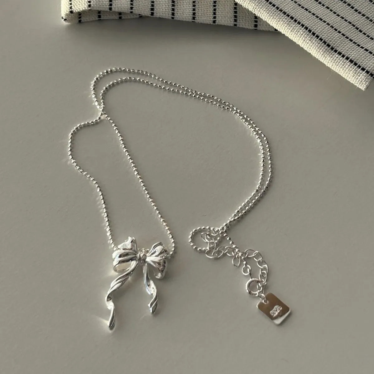 Necklaces With Hard Fit-Sterling Silver Simple Style Bow Knot Plating Pendant Necklace